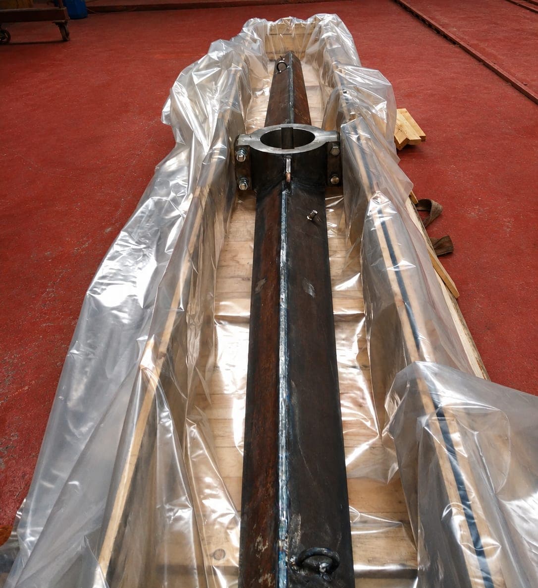 Fabricated conveyor housing with screw internals under inspection