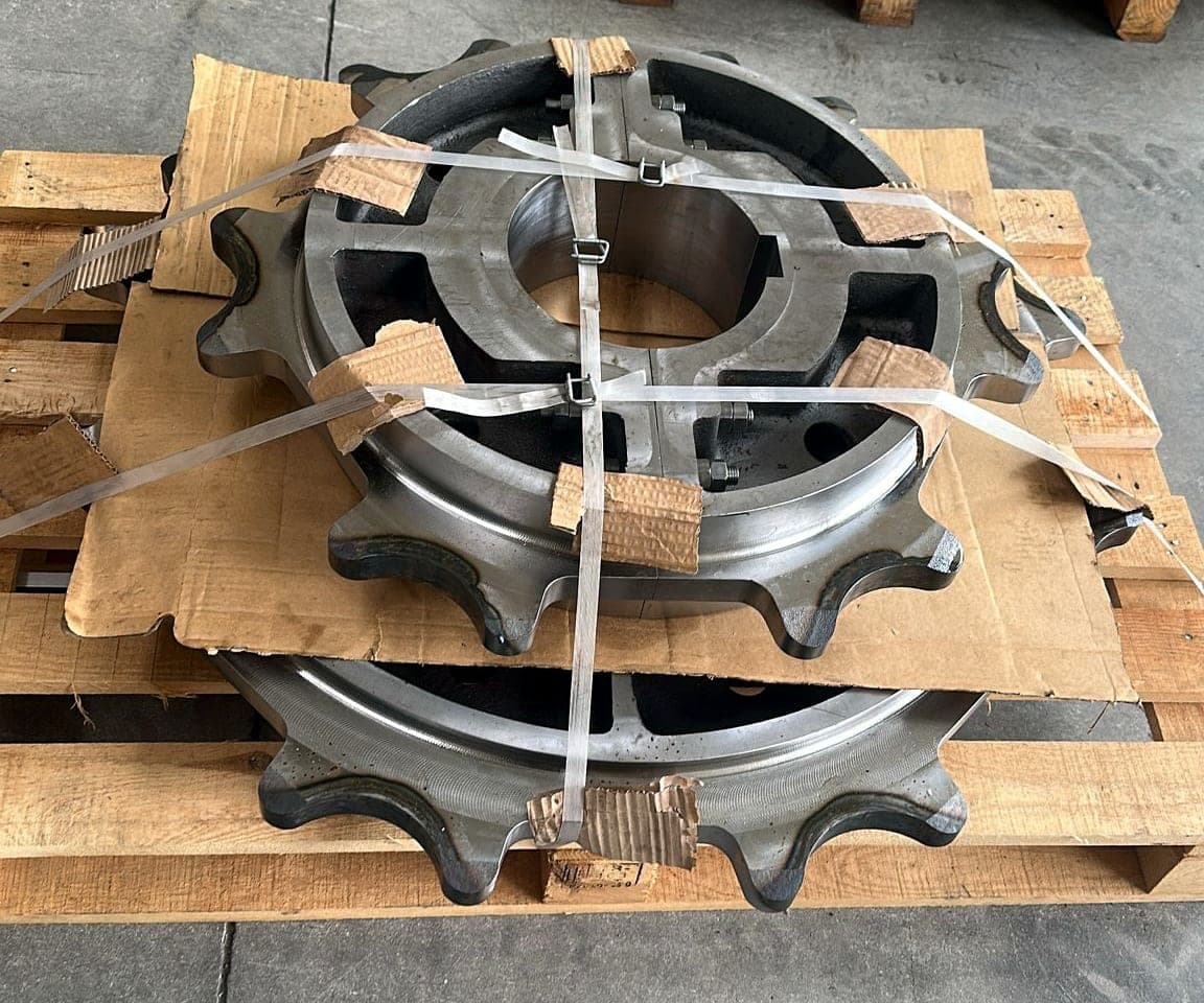 Split conveyor sprockets stacked and strapped on a pallet
