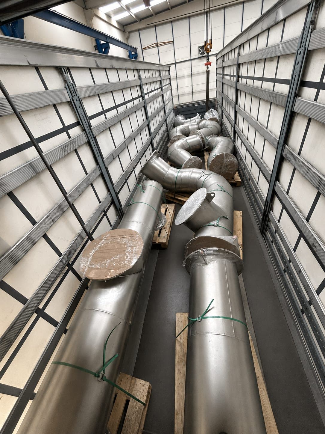 Welded spool assembly with elbows and flanges during fit-up